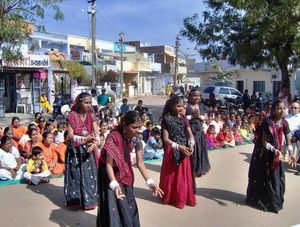 Children performing a dance at Subbu's Youth Dev. Centre